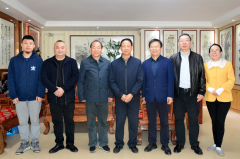 长沙市委一级巡视员谭小平在长沙市湘潭商会走访调研